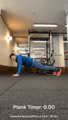 GIF shows the AI Plank Timer on the screen. A man is in plank position on the floor of the gym, with his elbows and feet touching the floor. The AI Plank counter starts automatically when he is in this position. As the man changes his position, the plank timer stops as it detects he not in the correct plank pose.