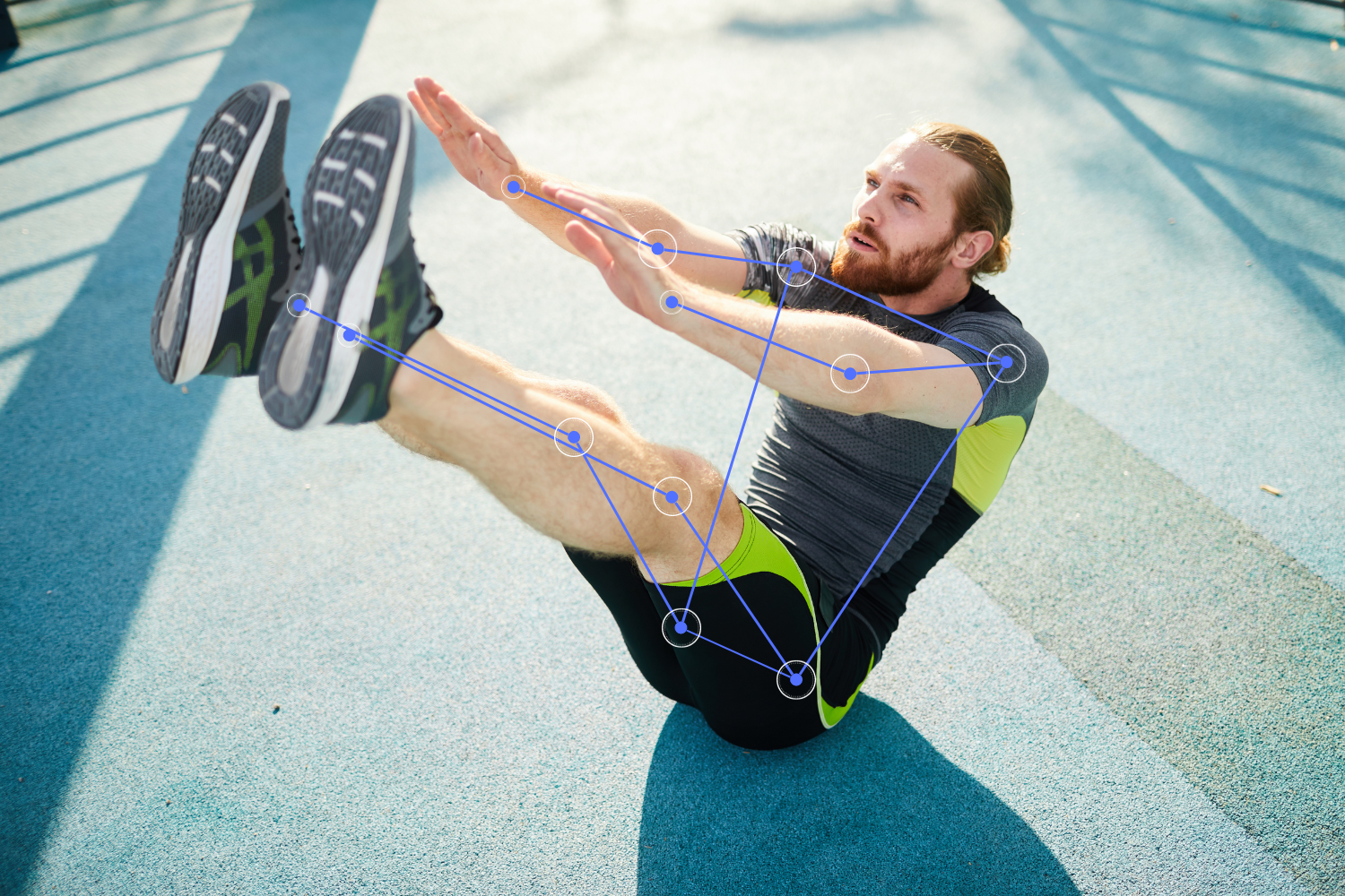 Image shows an athletic man doing V-up ab exercises with AI identifying his body landmarks.