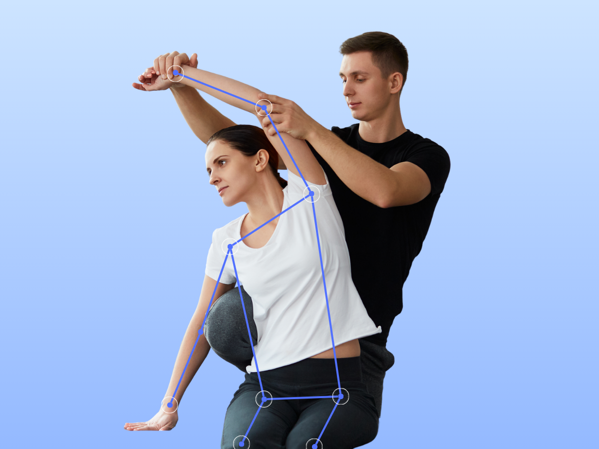 Image shows a physiotherapist doing rehab on a patient with pose estimation landmarks on her joints.